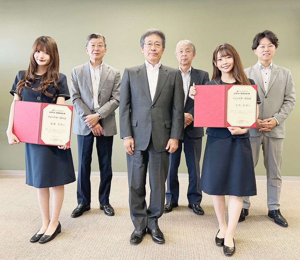 アンバサダー任命式(26年5月31日) 中央が鈴木社長
