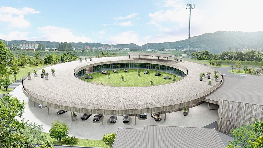 新車ディーラーでは極めて珍しいオーバル型の店舗を開設する
